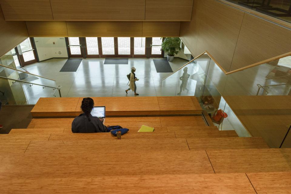 A student studies between classes at the Huang Engineering Center.