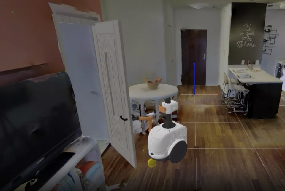 A robot interacts in a virtual environment. 