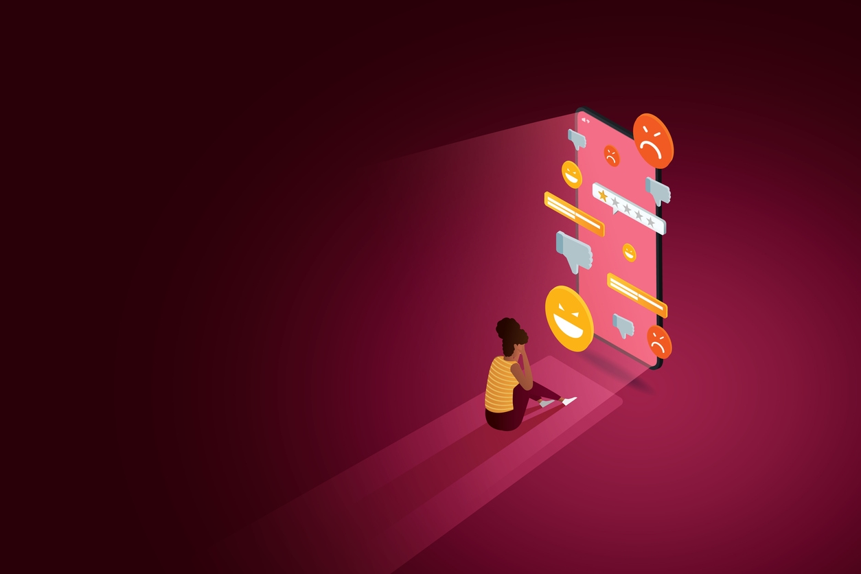 illustration of a woman staring at her phone that's filled with unhappy and angry emojis