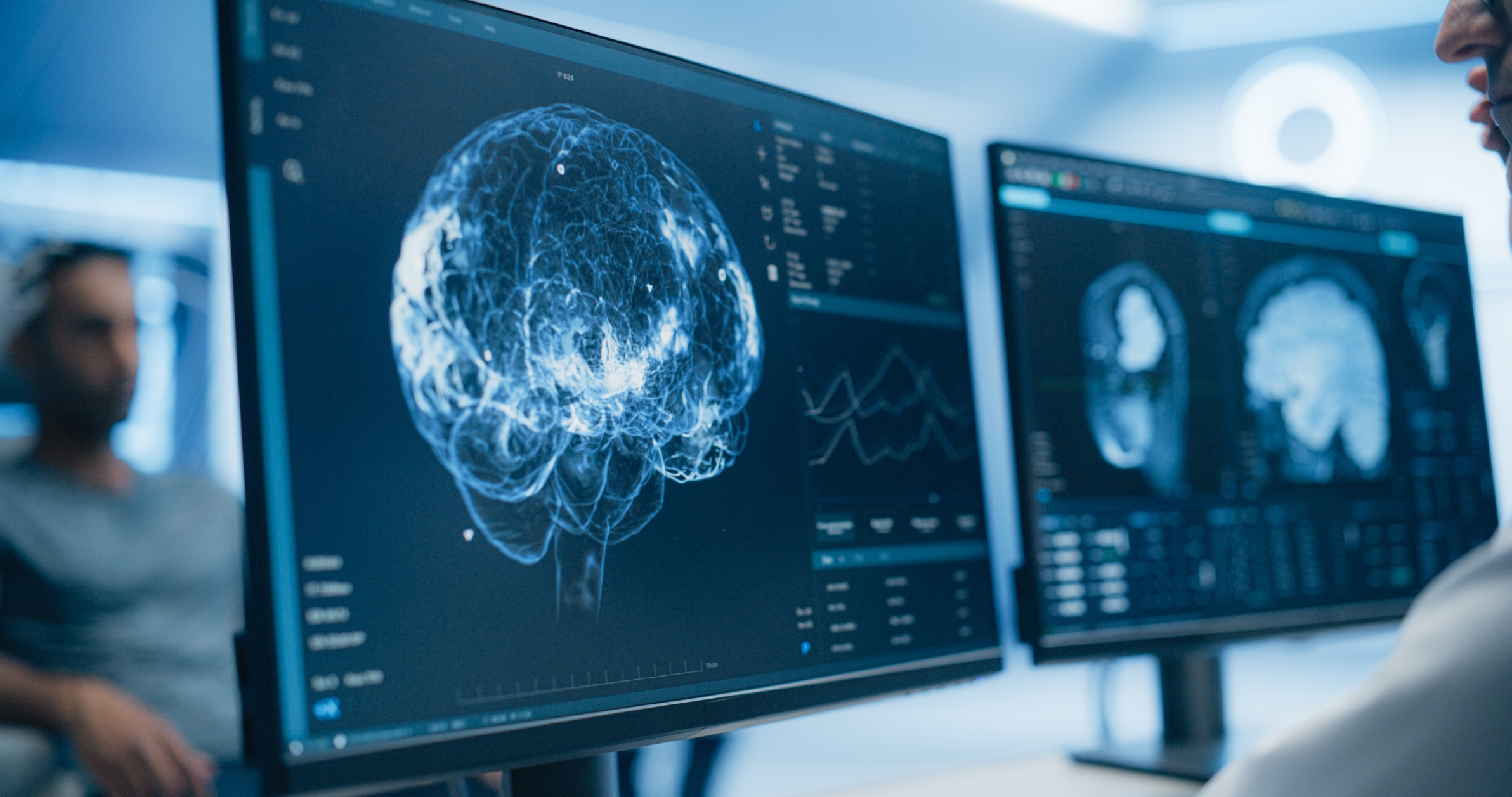 Medical Brain Scans on Multiple Computer Screens. Advanced Neuroimaging Technology Reveals Complex Neural Pathways, Display Showing CT Scan in a Modern Medical Environment