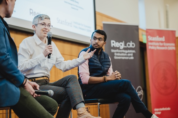 Riana Pfefferkorn speaks during a panel discussion