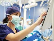 Doctor working with technology in operating room