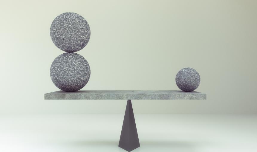 Abstract geometric ball on balance board stock photo