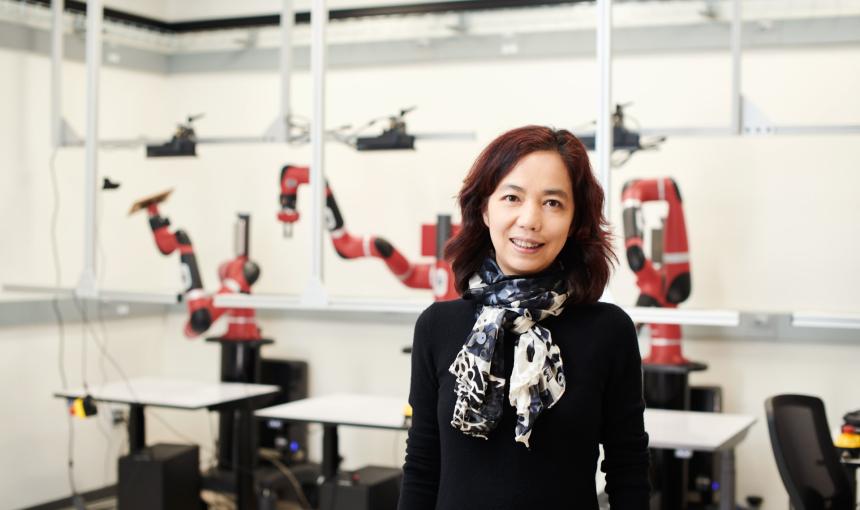 Fei-Fei Li in a robotics lab