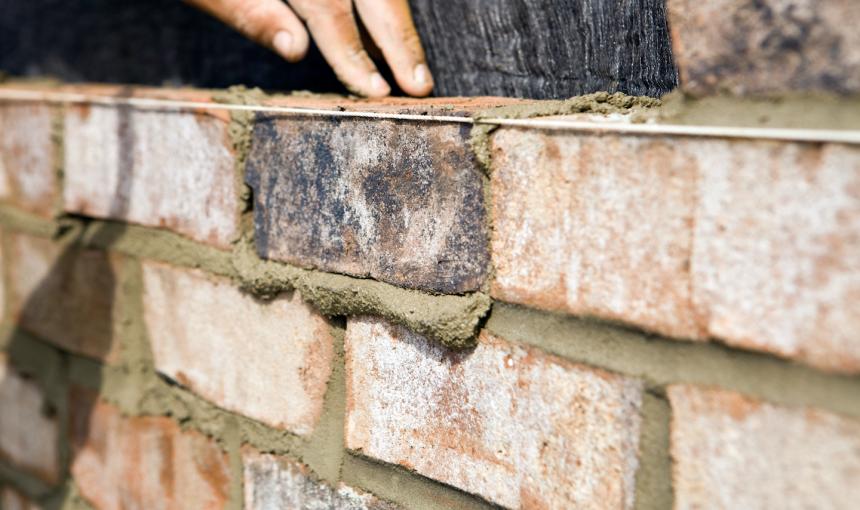 A brick wall being built