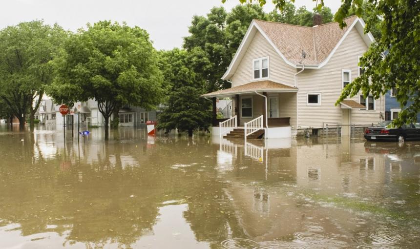A house partially submerged in water during a flood