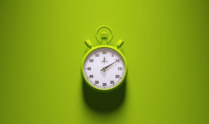 Image of a stopwatch on a bright green background