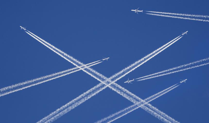 Planes flying across a blue sky