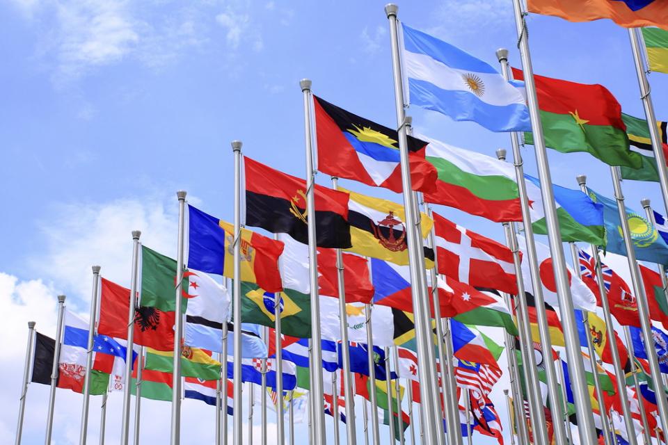 world flags flying in the wind