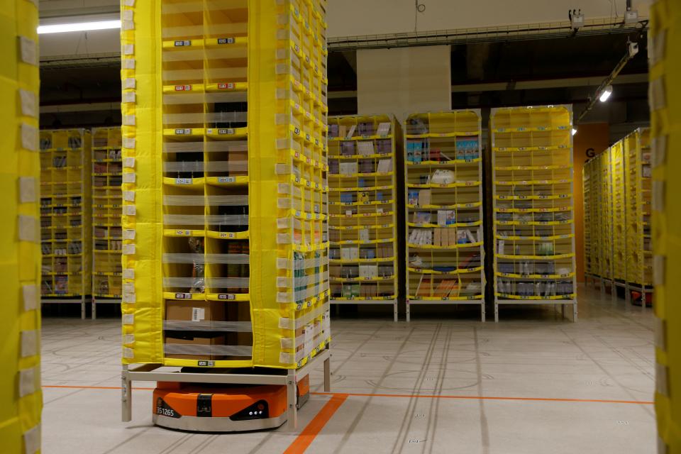 A robot is seen at the Amazon fulfilment center in Bretigny-sur-Orge near Paris, France