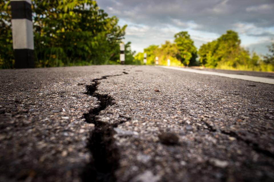 A crack along pavement caused by an earthquake