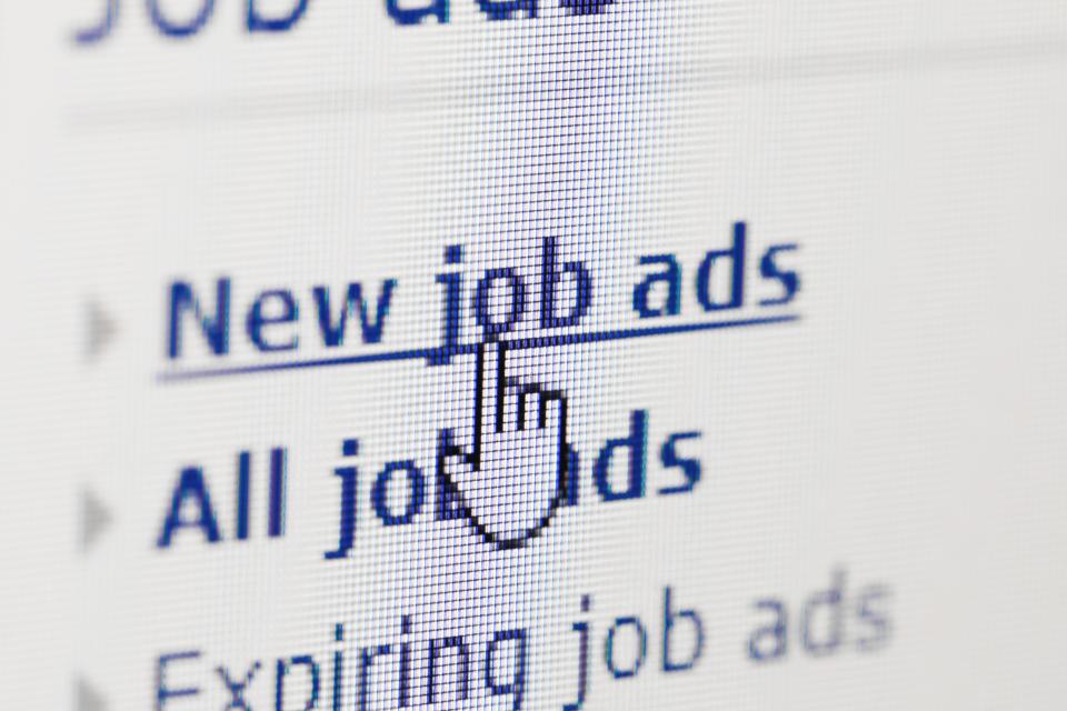 Computer curser hovers over a link that reads "new job ads"