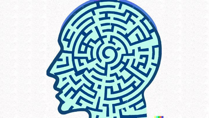 Outline of a human head filled with a labyrinth