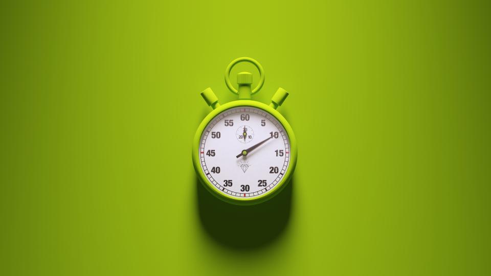 Image of a stopwatch on a bright green background
